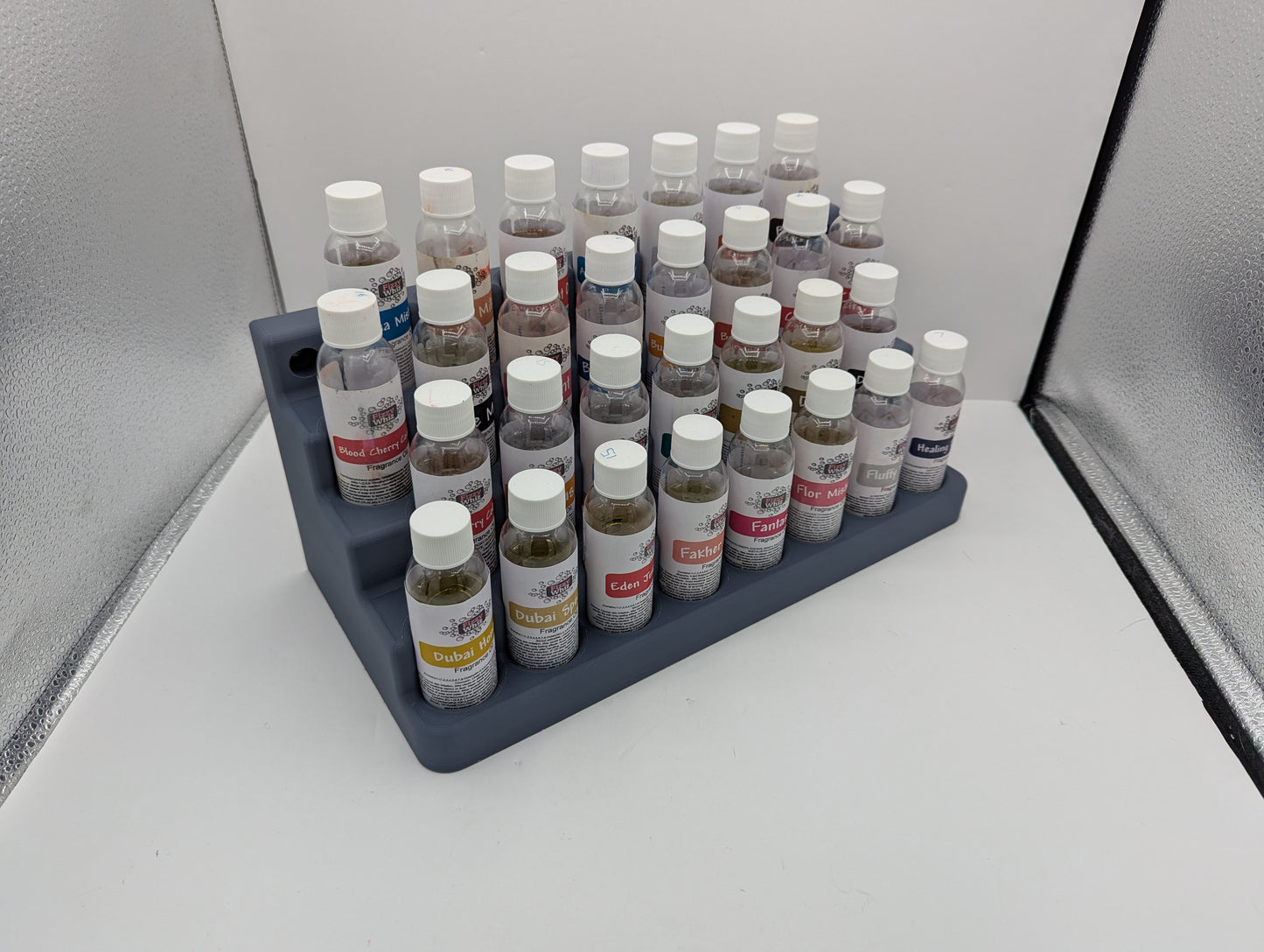 Storage for 50ml bottles. 30 spaces for 32mm dia 107mm tall bottles.