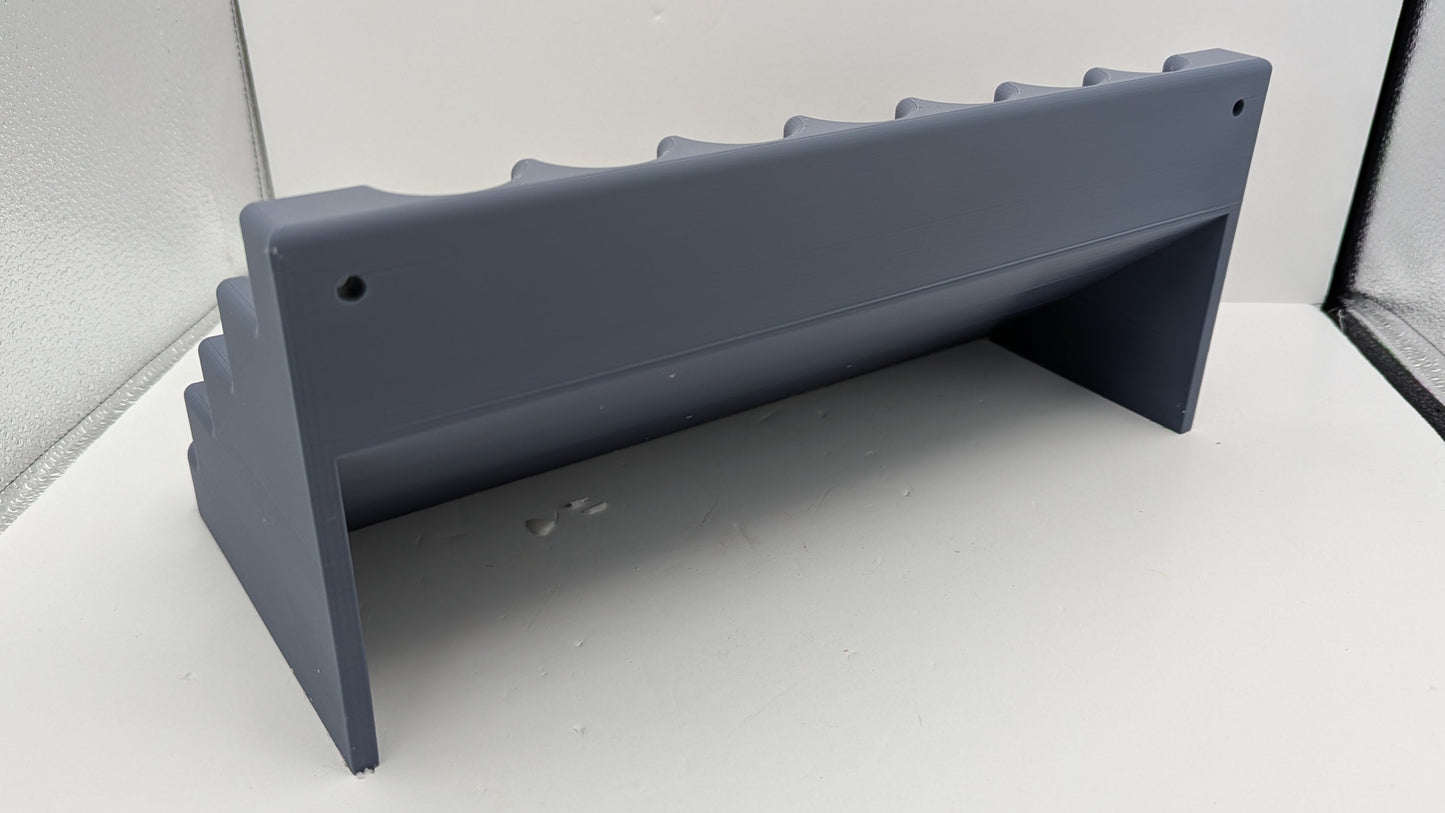 Storage for 50ml bottles. 30 spaces for 32mm dia 107mm tall bottles.