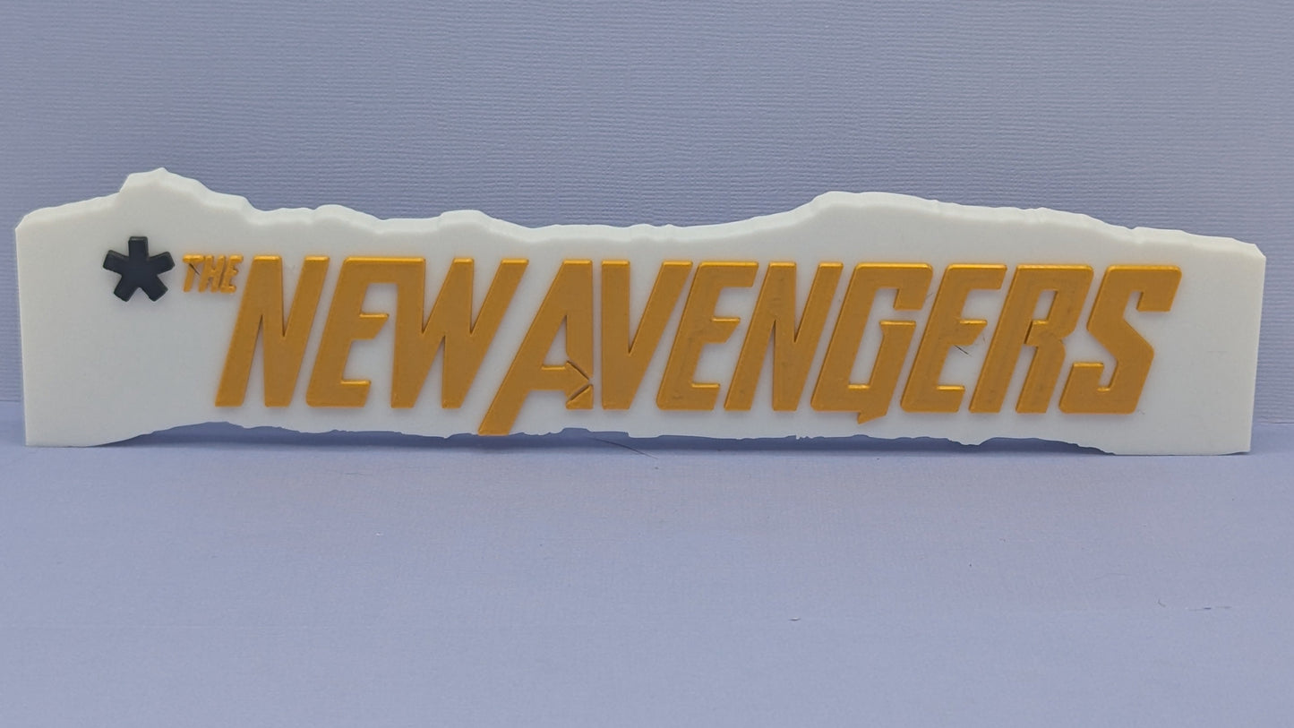 Decorative sign with 'NEW AVENGERS' text on a plain background
