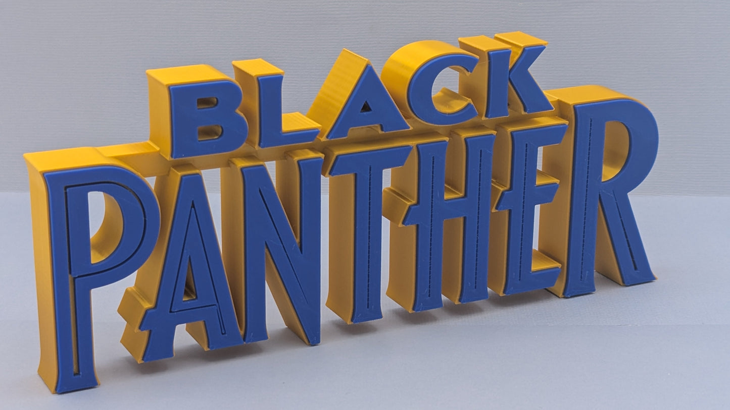 3D text 'BLACK PANTHER' in yellow and blue on a gray background