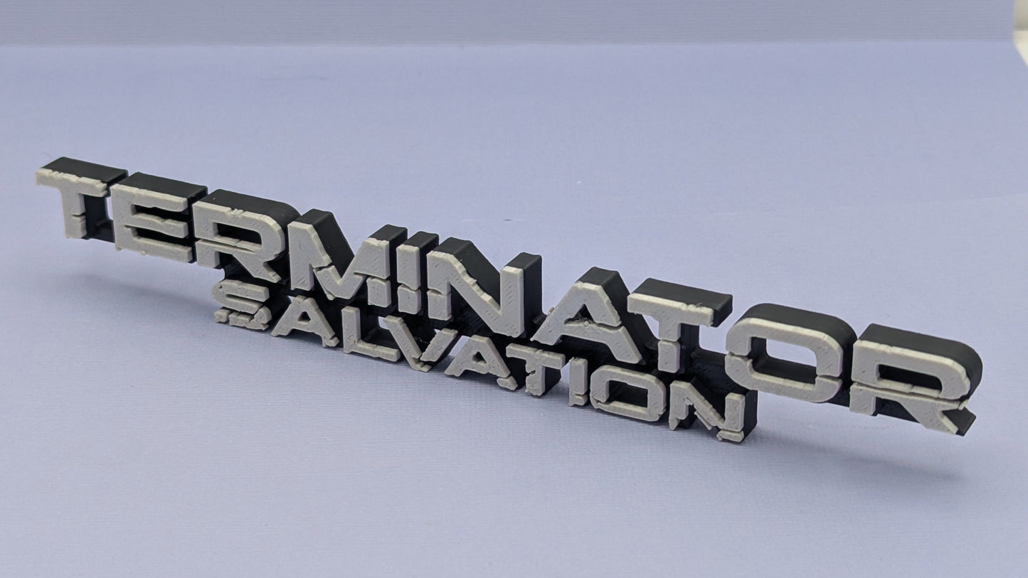 Metallic 'TERMINATOR SALVATION' logo on a light gray background
