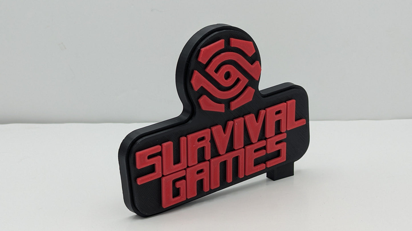 Black and red 'Survival Games' sign on a white background