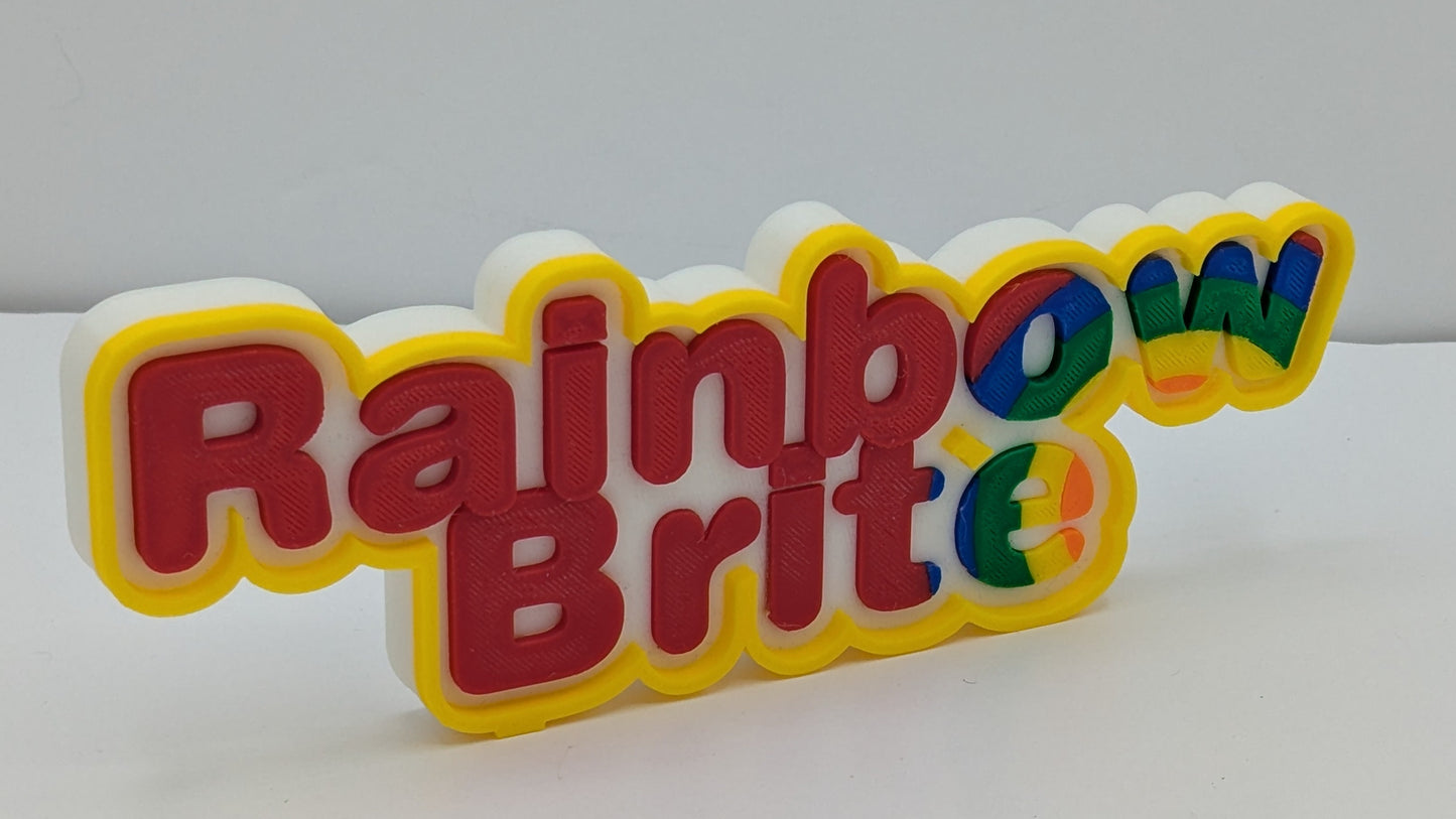Colorful 'Rainbow Brit' logo on a white background