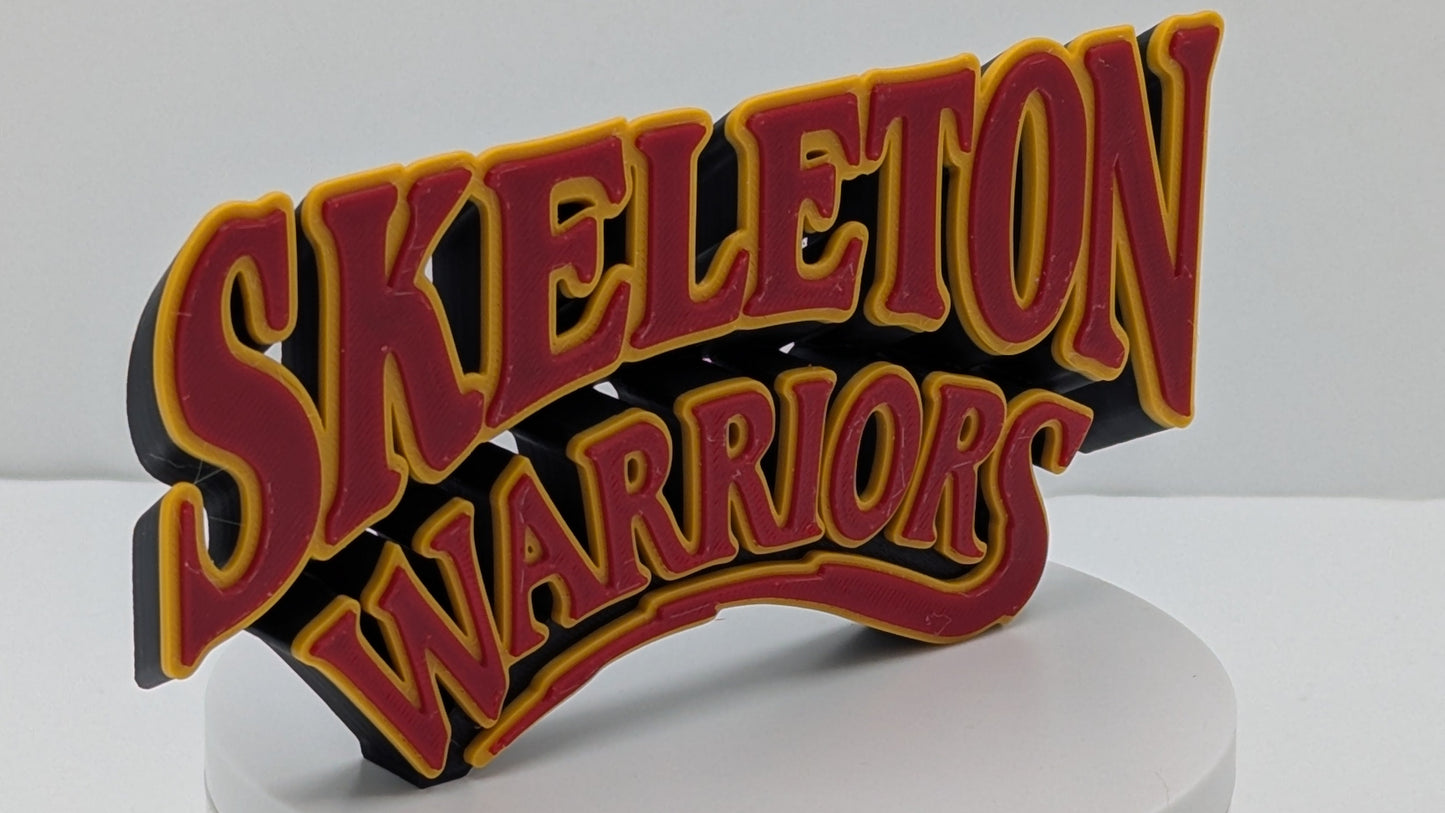 Decorative sign with 'Skeleton Warriors' text on a white base