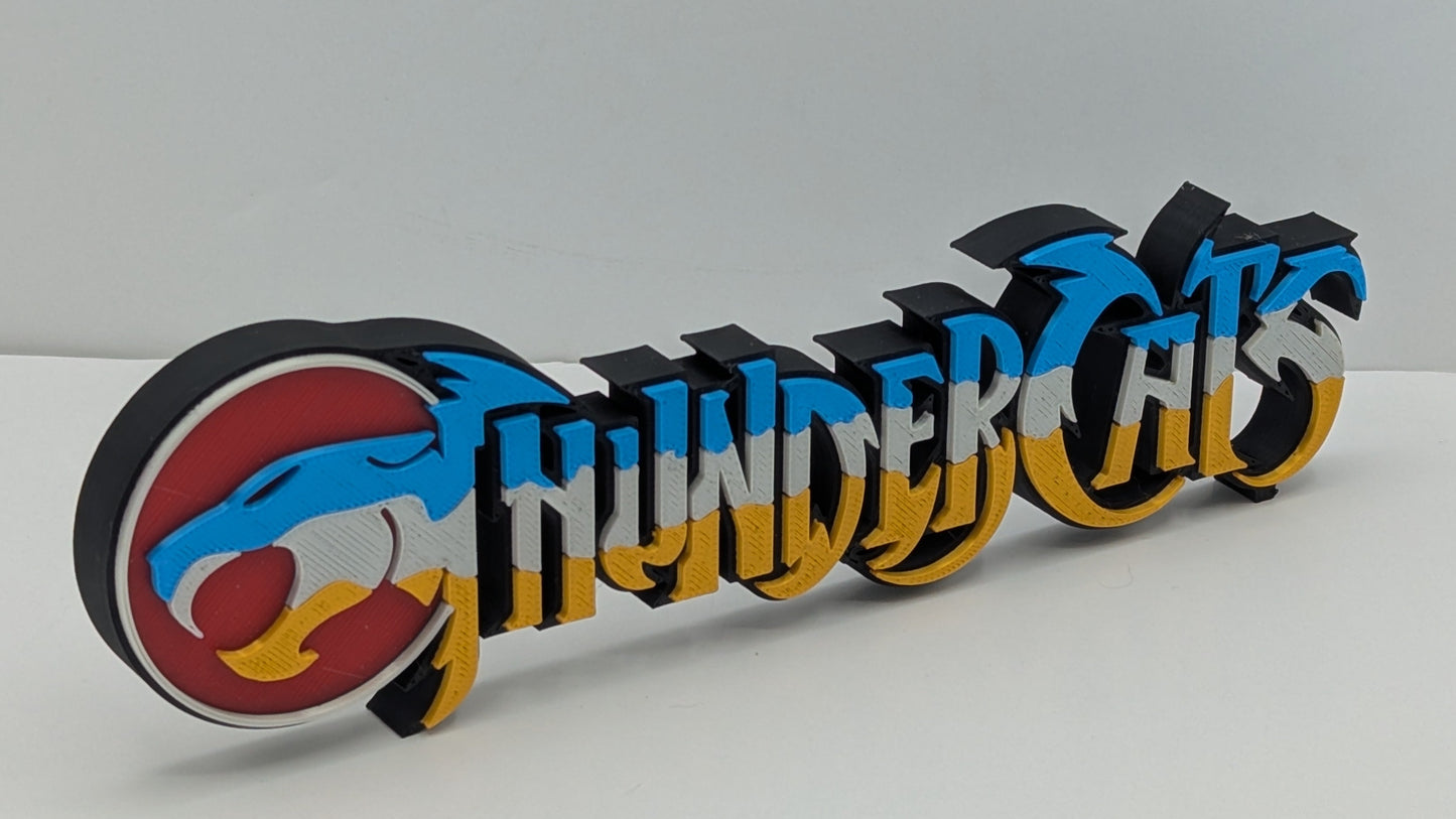 3D printed 'Thundercats' logo on a white background