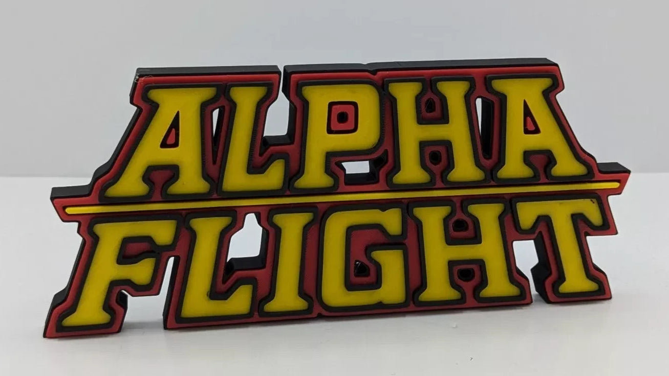 Alpha Flight logo in yellow and red on a white background