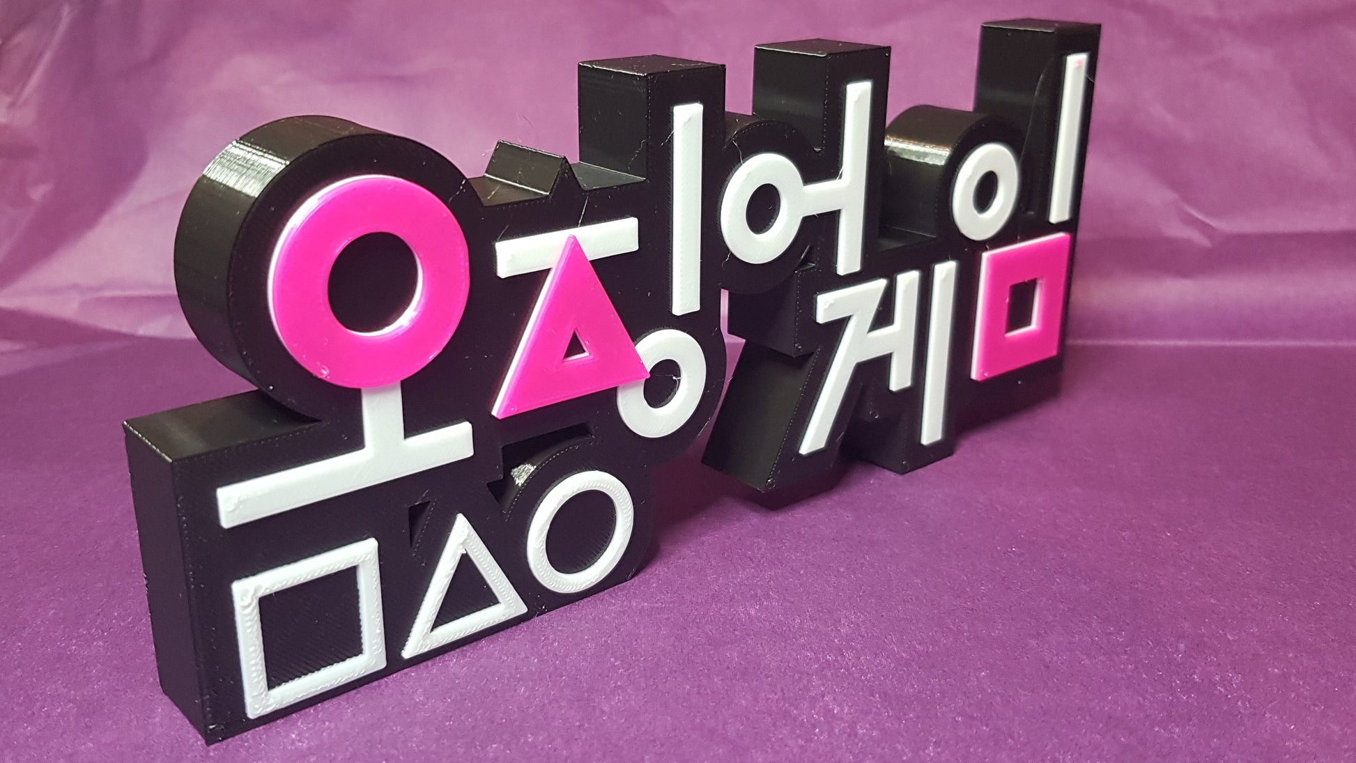 Squid game logo in the original Korean