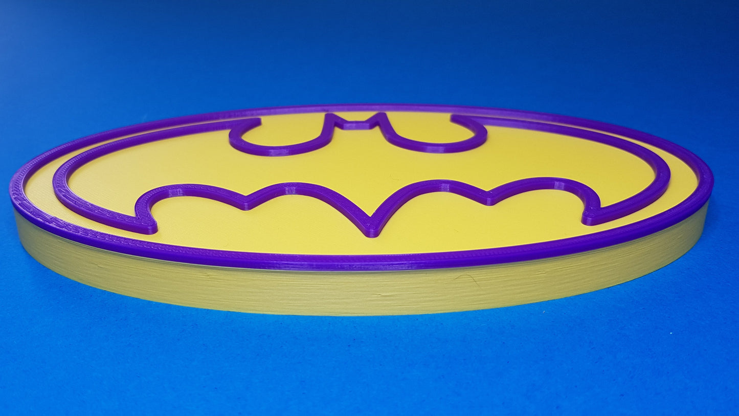 Batman logo on a blue background