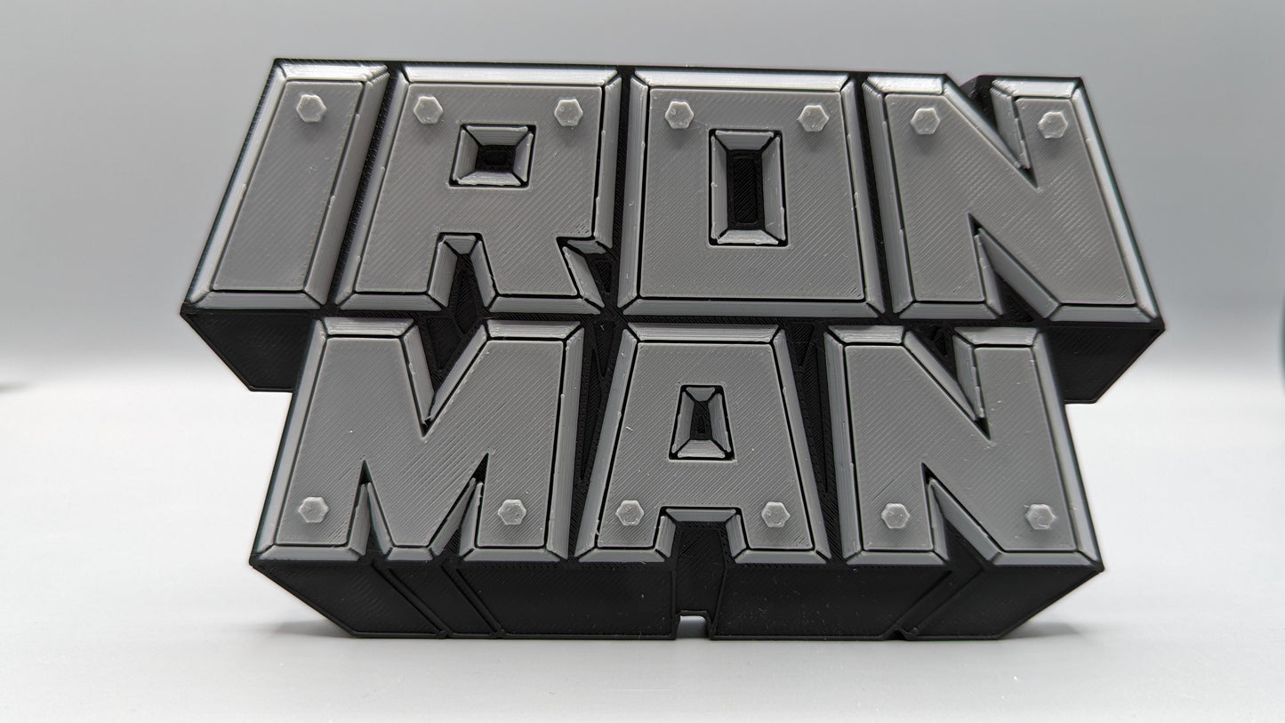 Black 'IRON MAN' logo on a white background