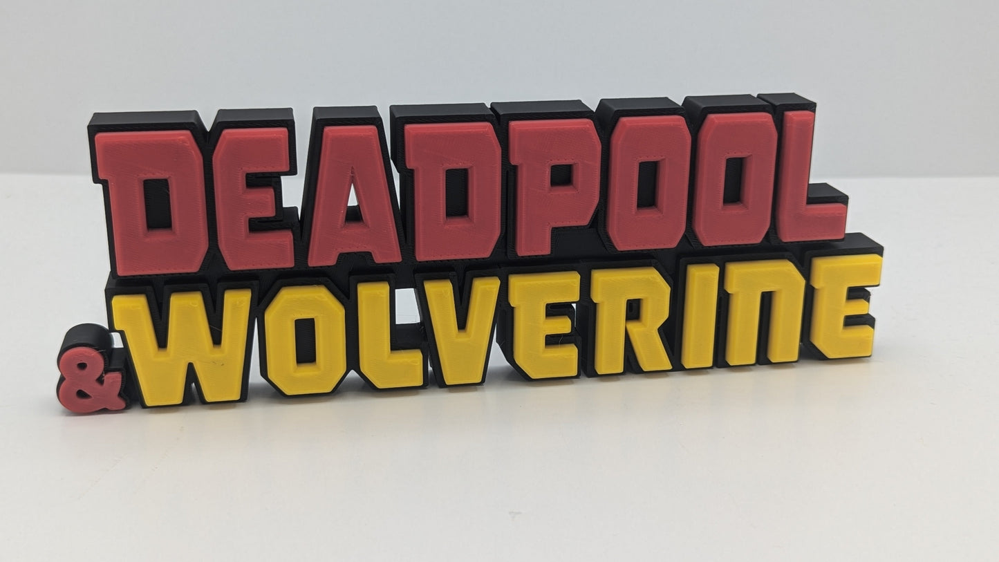 Decorative sign with 'DEADPOOL & WOLVERINE' text in red, yellow, and black on a white background