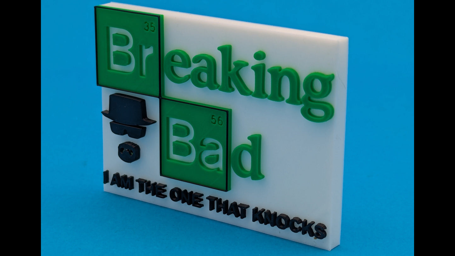 Breaking Bad-themed decorative sign with green text and a black silhouette on a blue background