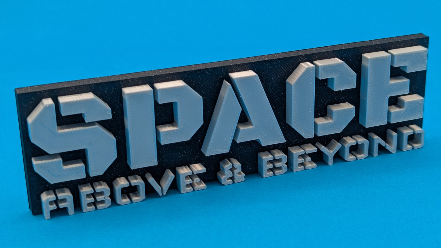 3D metal sign with 'SPACE ABOVE & BEYOND' text on a blue background