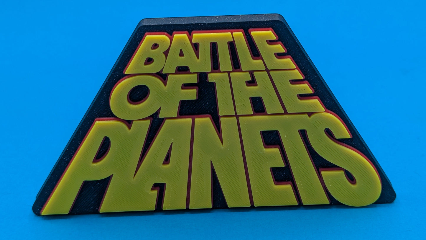 Triangular badge with 'Battle of the Planets' text on a blue background