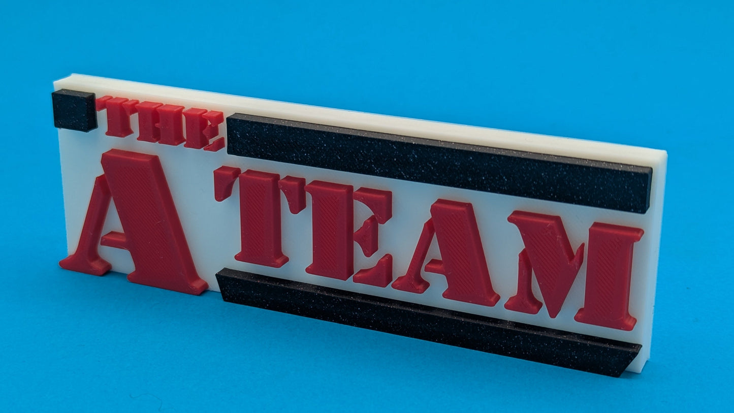 3D-printed 'The A-Team' logo on a blue background