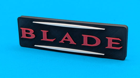 Black and red 'BLADE' logo on a blue background