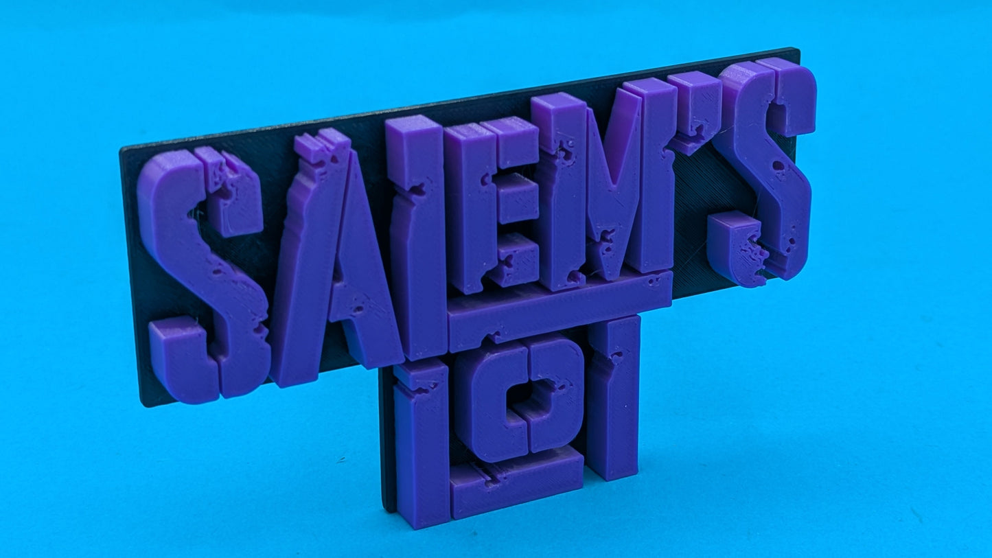 Purple 'Salem's Lot sign on a blue background