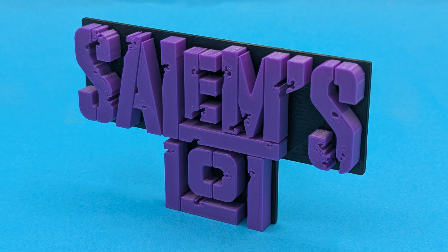 Purple 'Salem's Lot' sign on a blue background