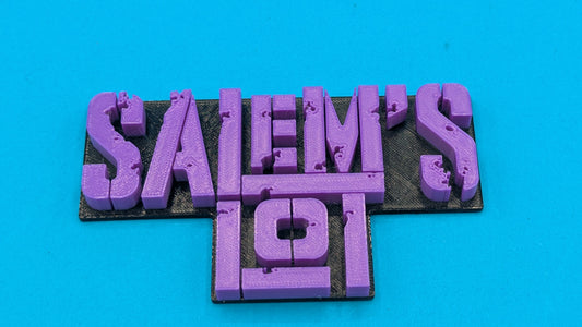 Purple 'Salem's Lot sign on a blue background