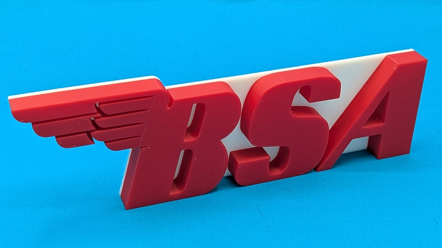 Red 'BSA' logo on a blue background