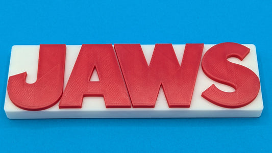 Red 'JAWS' logo on a white background with a blue gradient