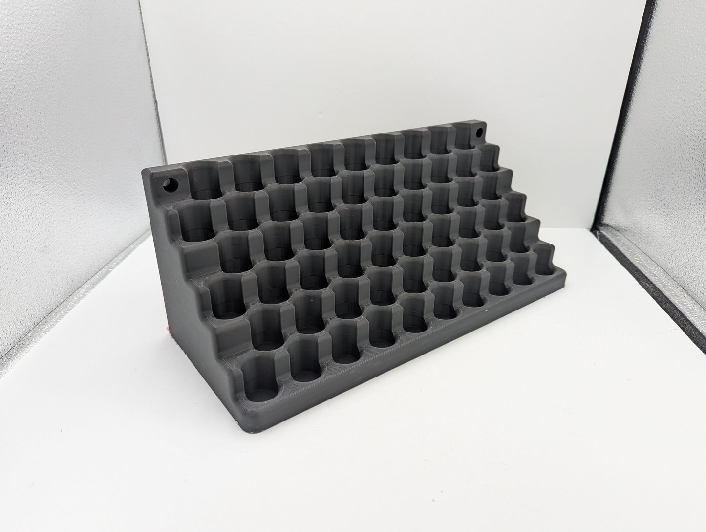 3D Print file - Storage for 10mm dropper bottles. 57 spaces for 21mm dia 70mm tall bottles.