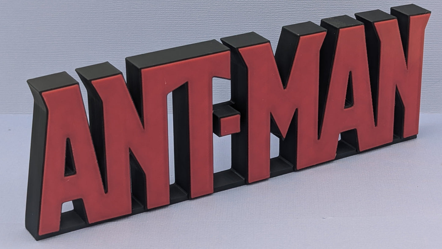 Red and black 'ANT-MAN' logo on a light gray background