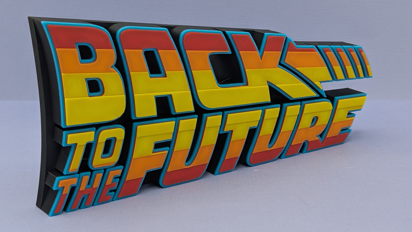 3D sign with 'Back to the Future' text in retro colors on a plain background