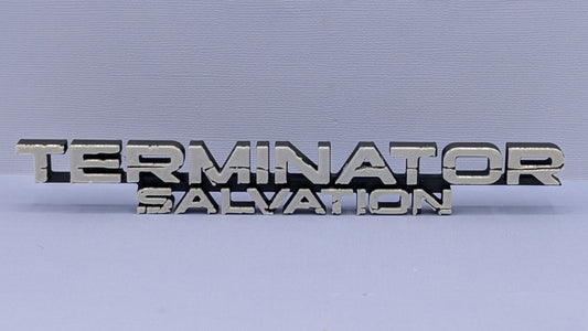 Metallic 'Terminator Salvation' logo on a reflective surface