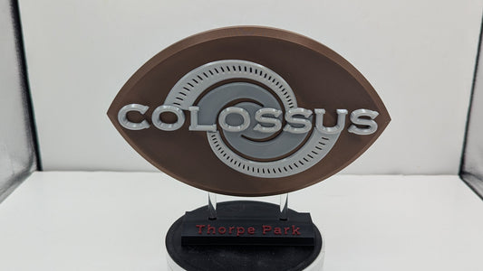 Colossus logo on a display stand with a white background