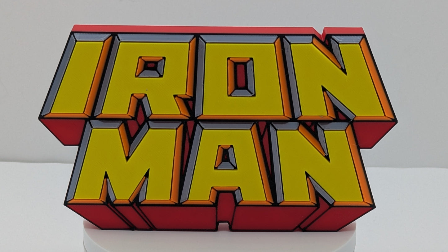 3D logo of 'Iron Man' in yellow and red on a white background