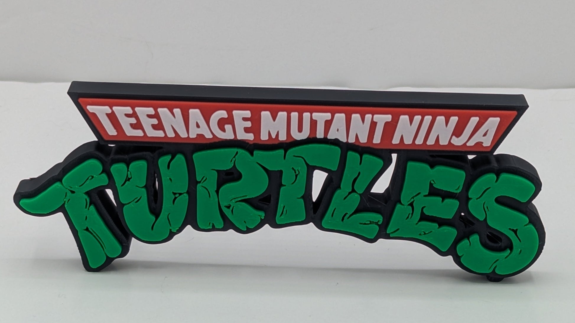 Logo of Teenage Mutant Ninja Turtles on a white background