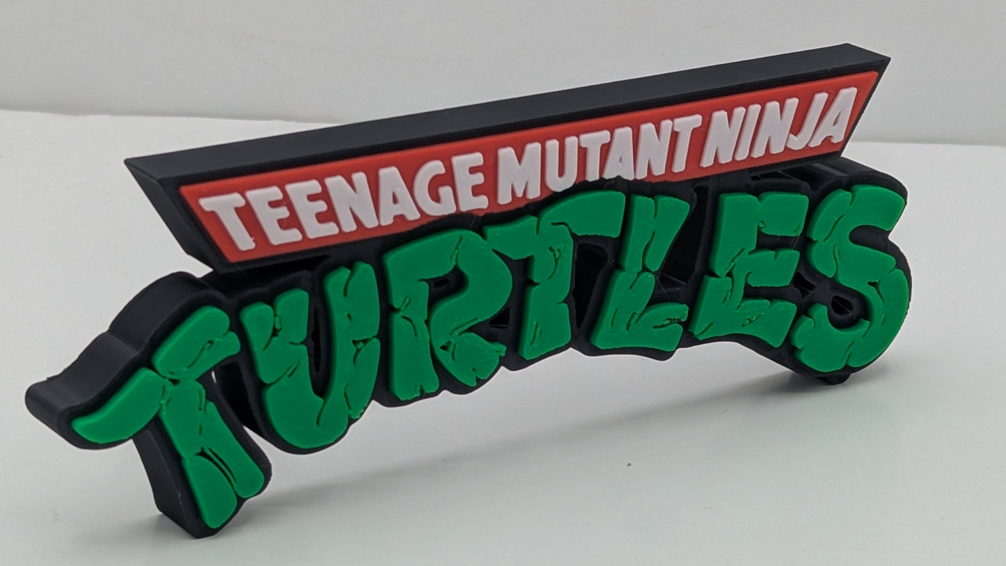 Teenage Mutant Ninja Turtles logo on a white background
