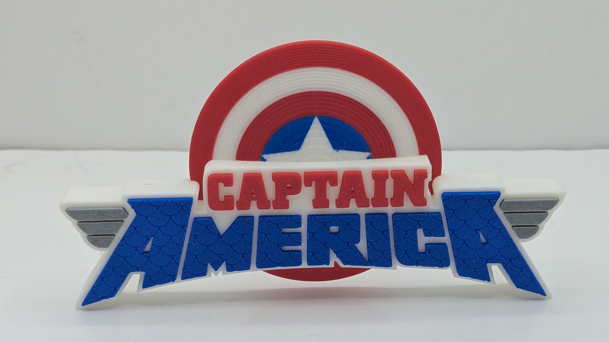 Captain America logo on a white background