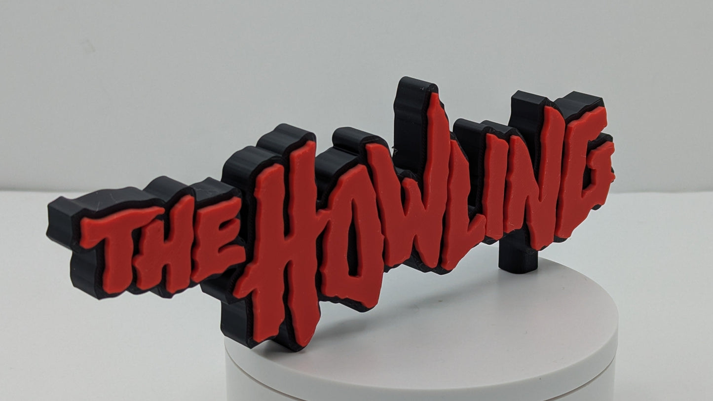 3D printed logo on a round base with a white background