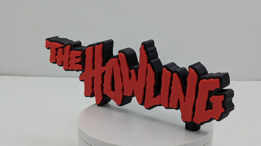 3D printed logo with 'The Howling' text on a white base