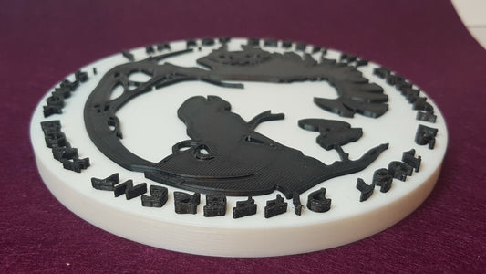 Alice meets the Cheshire cat. Silhouette wall plaque. 150mm diameter.