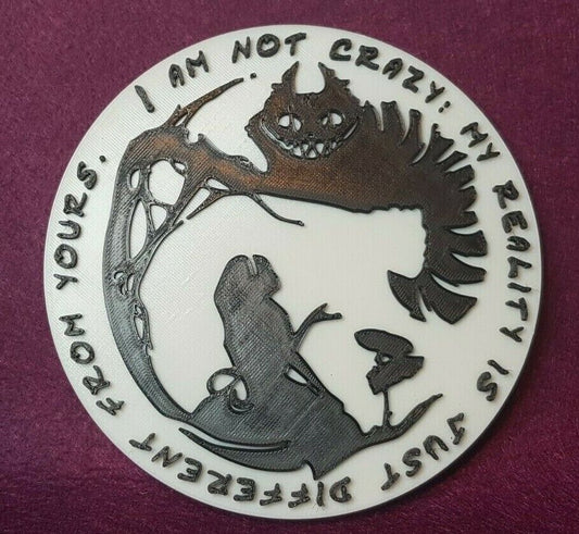 Alice meets the Cheshire cat. Silhouette wall plaque. 150mm diameter.